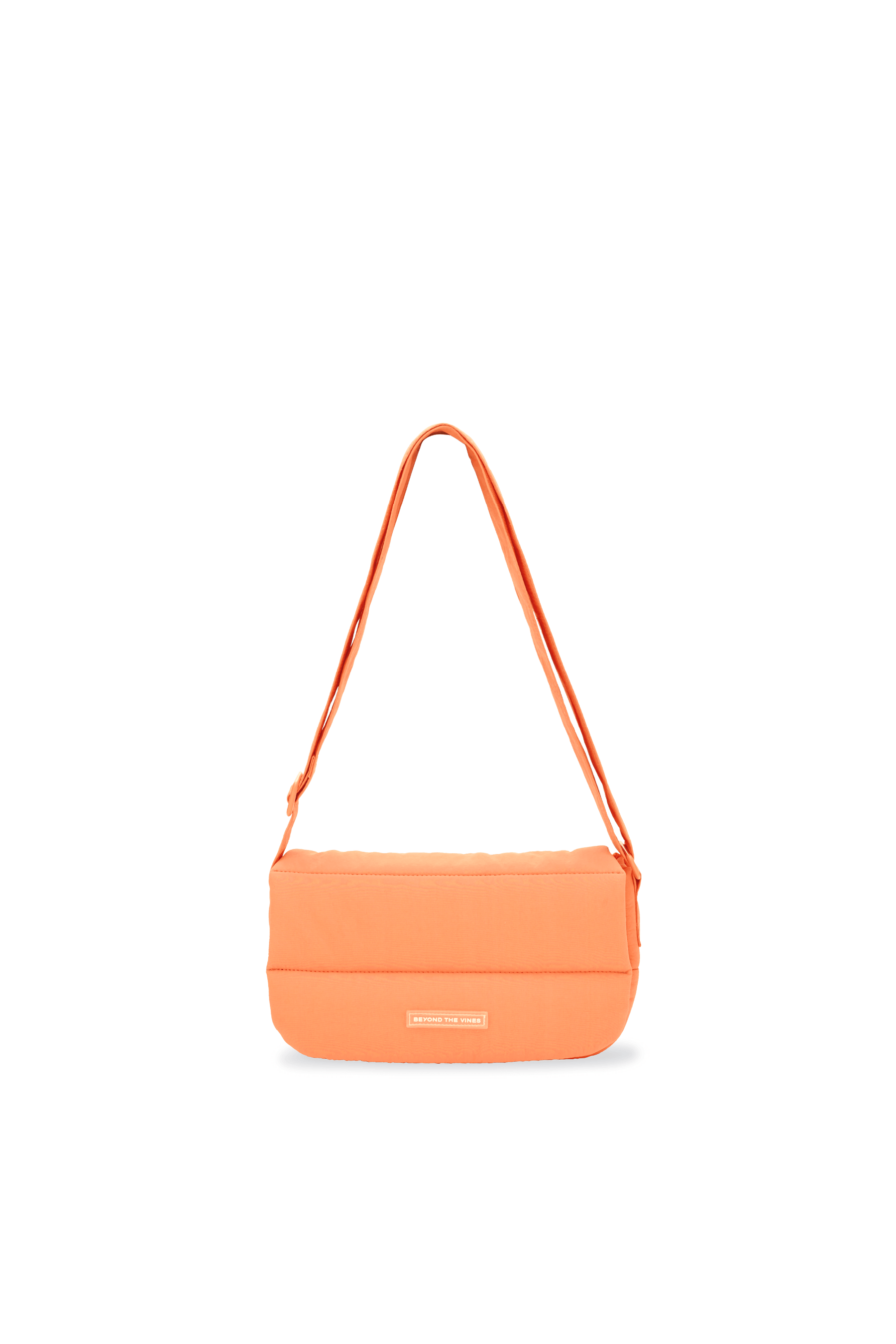 Poofy bag beyond the vines